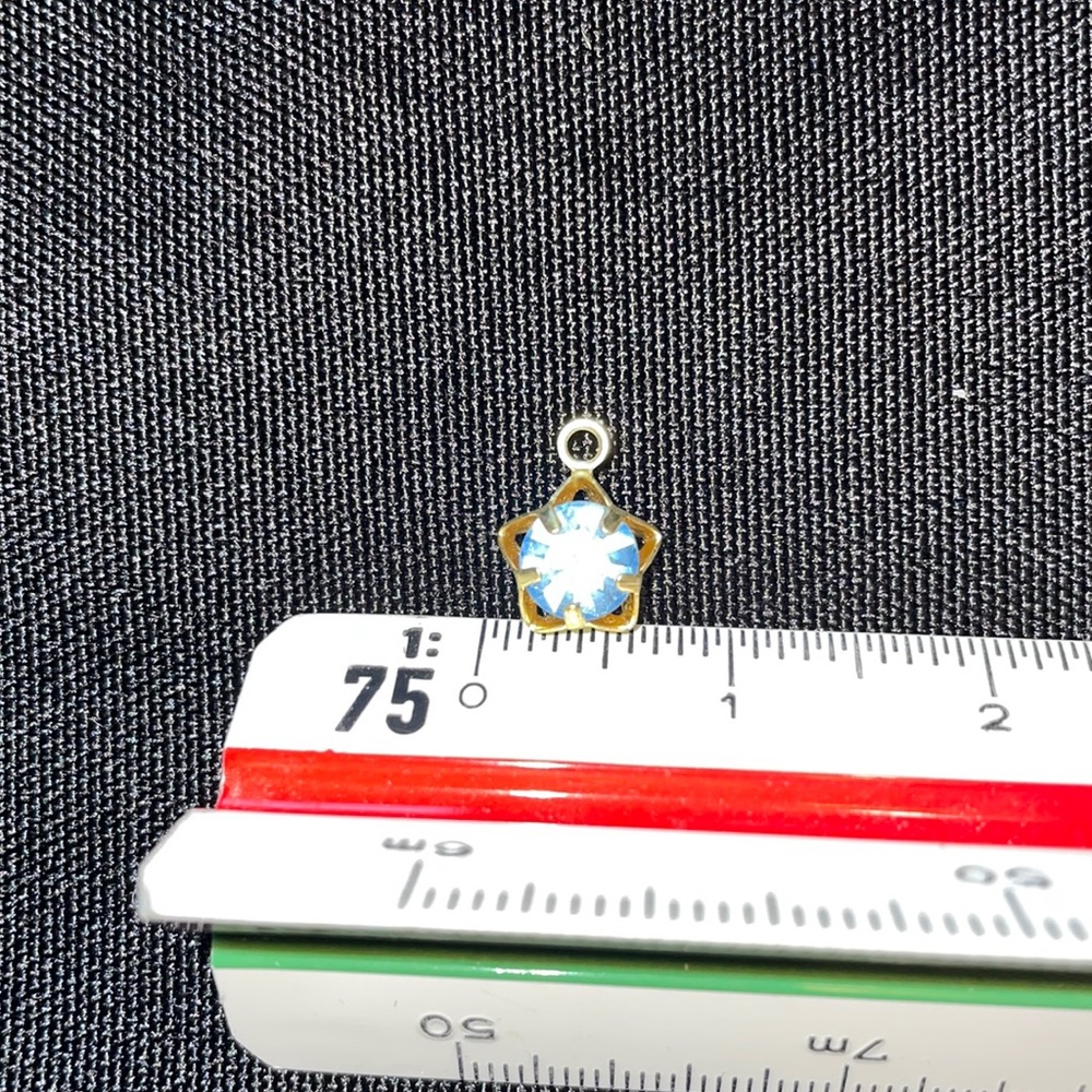 Blue Swarovski crystal in gold star charms
